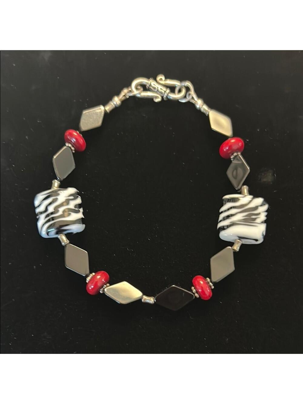 Black and White Beaded Bracelet with Red Accents